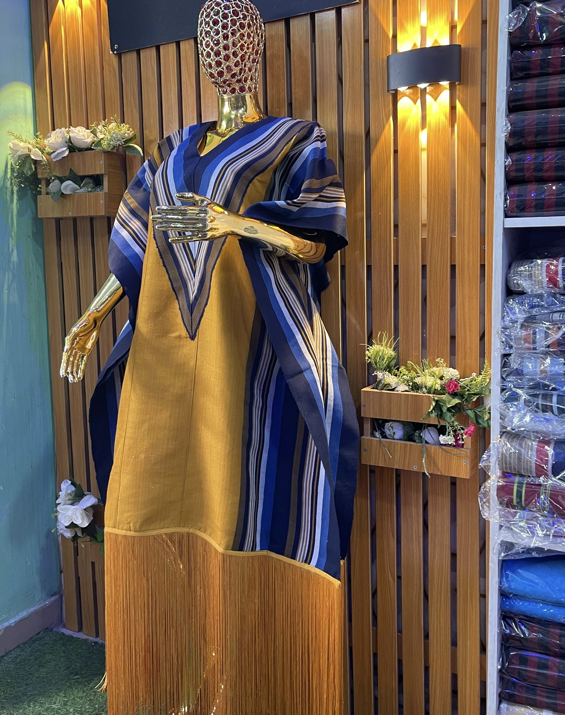 Mustard and navy kaftan with layered V-stripes and mustard fringe